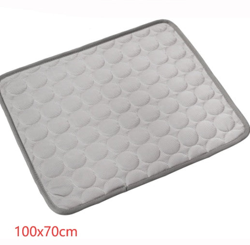 Gray quilted mat with textured pattern on a white background
