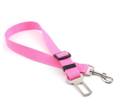 Pink car safety belt with a clip on a white background