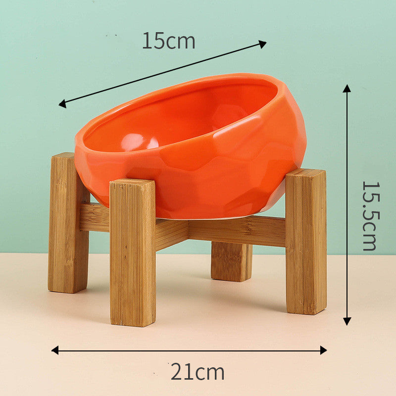 Empty ceramic oblique pet bowl with smooth tilted shape and elegant finish