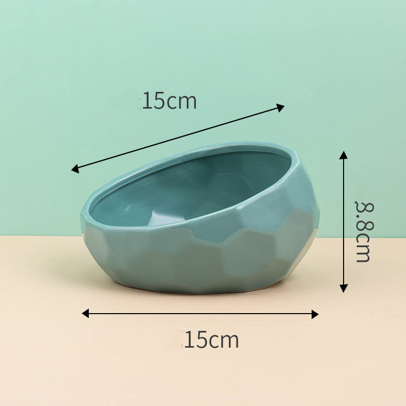 Tilted ceramic pet bowl with modern oblique mouth design for comfortable feeding