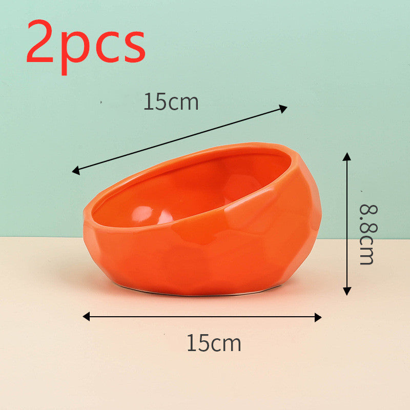 Side view of ceramic pet bowl showing elevated tilted structure and stable base