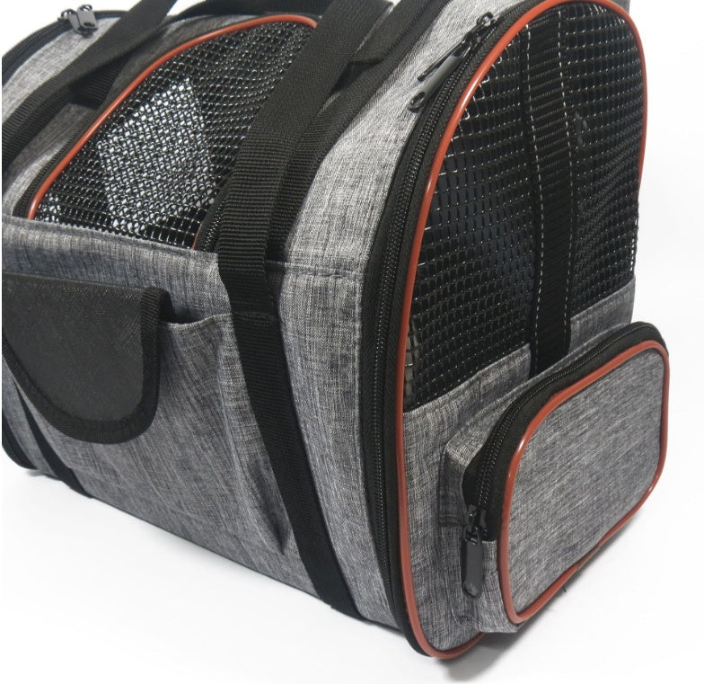 Portable pet carrier basket with strong top handle for easy carrying outdoors