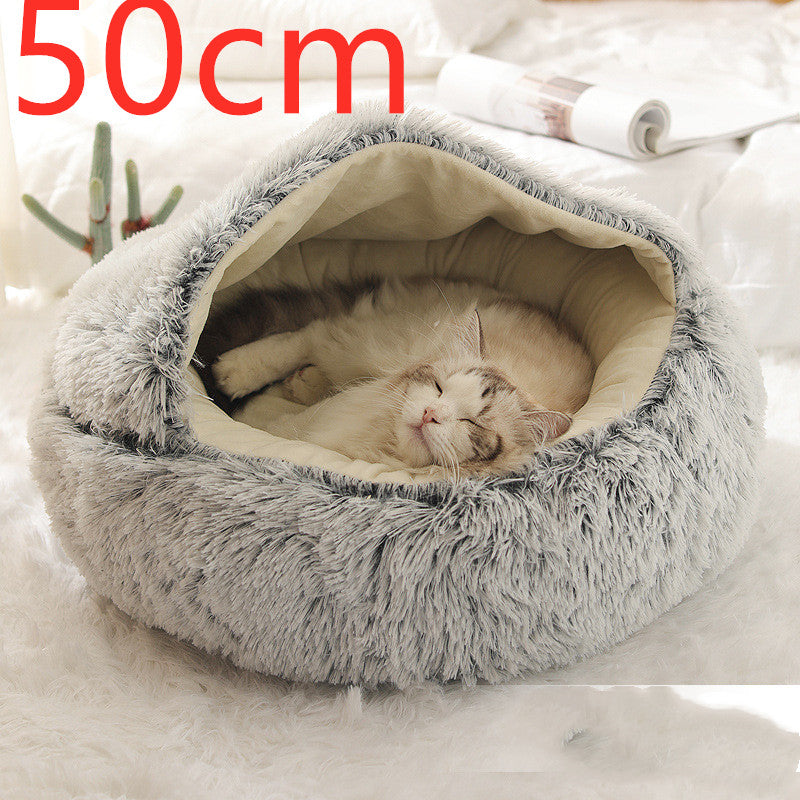 Cat lying in a fluffy gray pet bed with a size label '50cm' above.