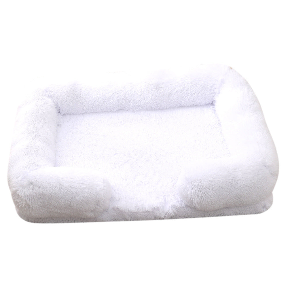 White fluffy pet bed on a white background