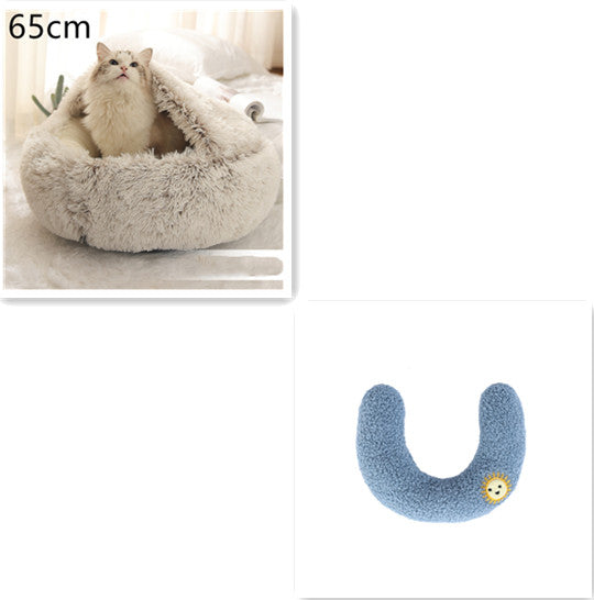 Cat lying in a fluffy beige pet bed with a size indicator '65cm' on the left, and a blue U-shaped pet toy on the right.