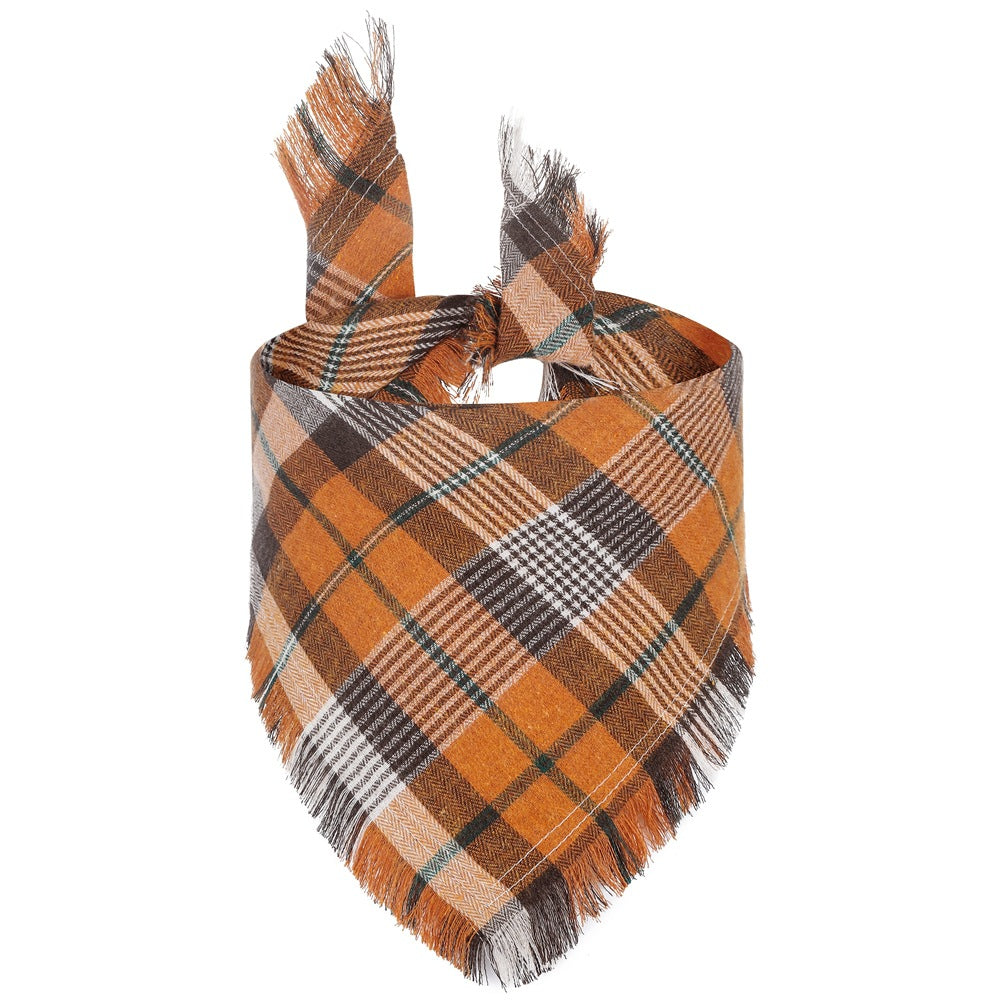 Plaid scarf with fringes on a white background