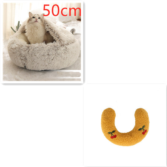 Cat lying in a fluffy pet bed with a size indicator '50cm' and a yellow U-shaped cat toy with red accents on a white background.