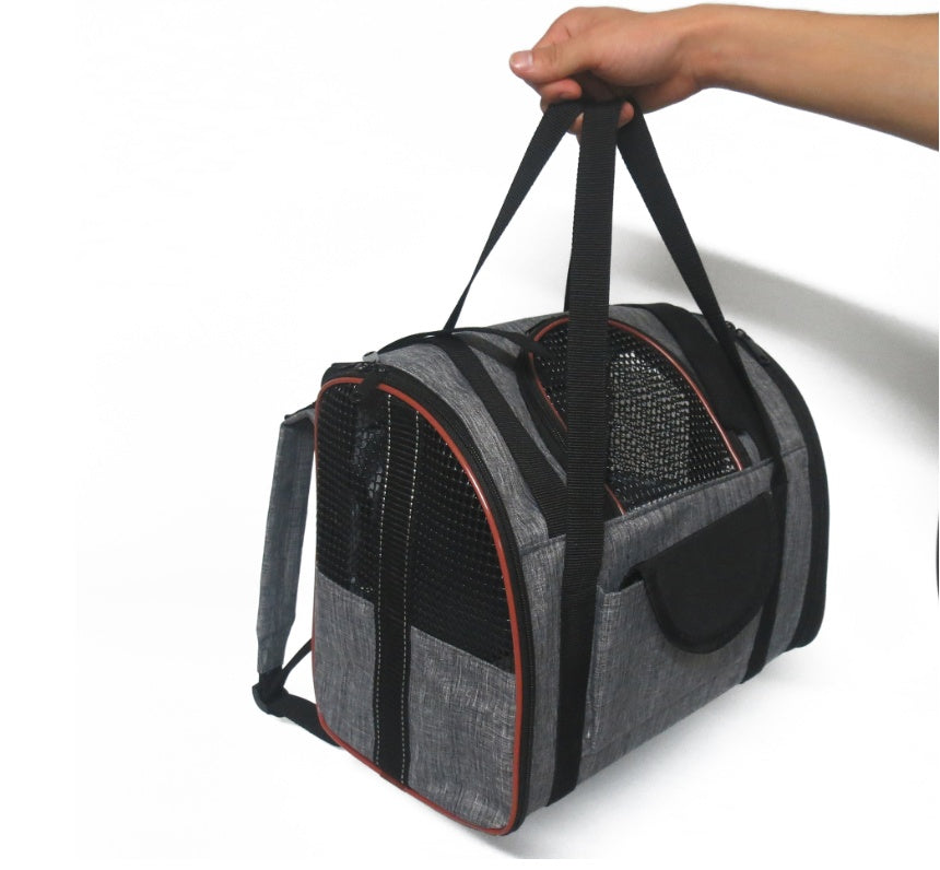Front view of pet carrier basket with zipper closure and spacious interior