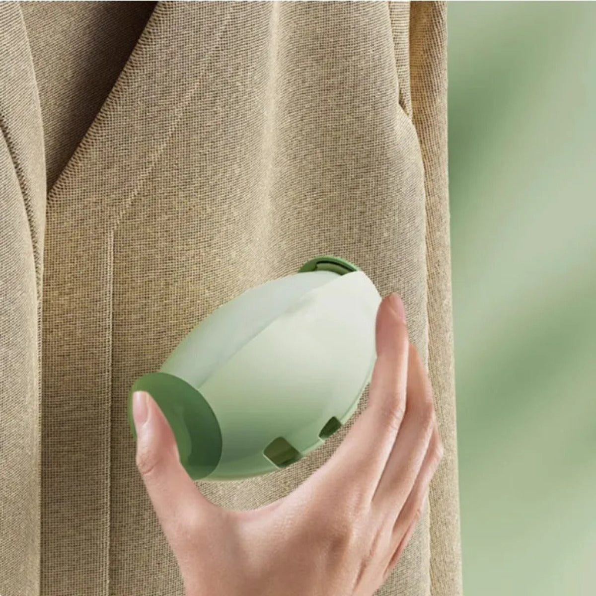 Washable pet hair lint roller being cleaned under water for repeated daily use