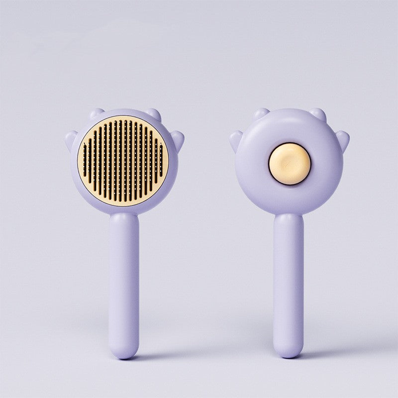Non slip ergonomic handle on cat massage comb for safe and controlled grooming