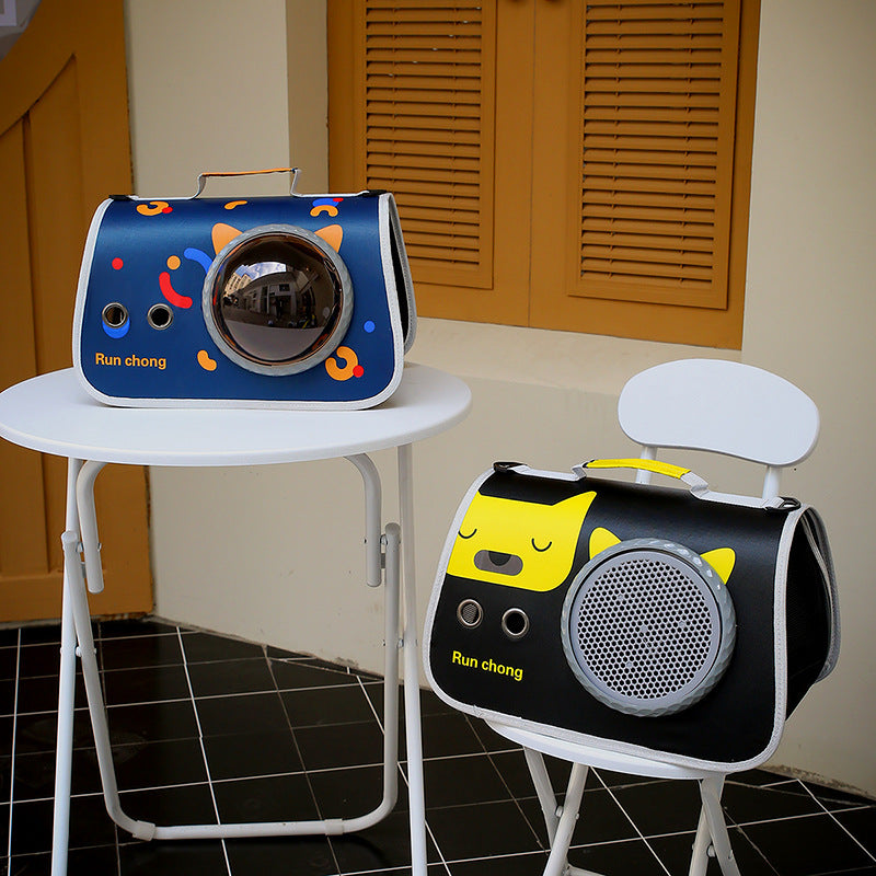 Two pet carriers, one blue and one black with yellow accents, on white stools against a neutral background.