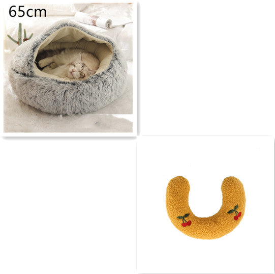 Fluffy pet bed with a cat inside and a yellow U-shaped cushion on a white background.