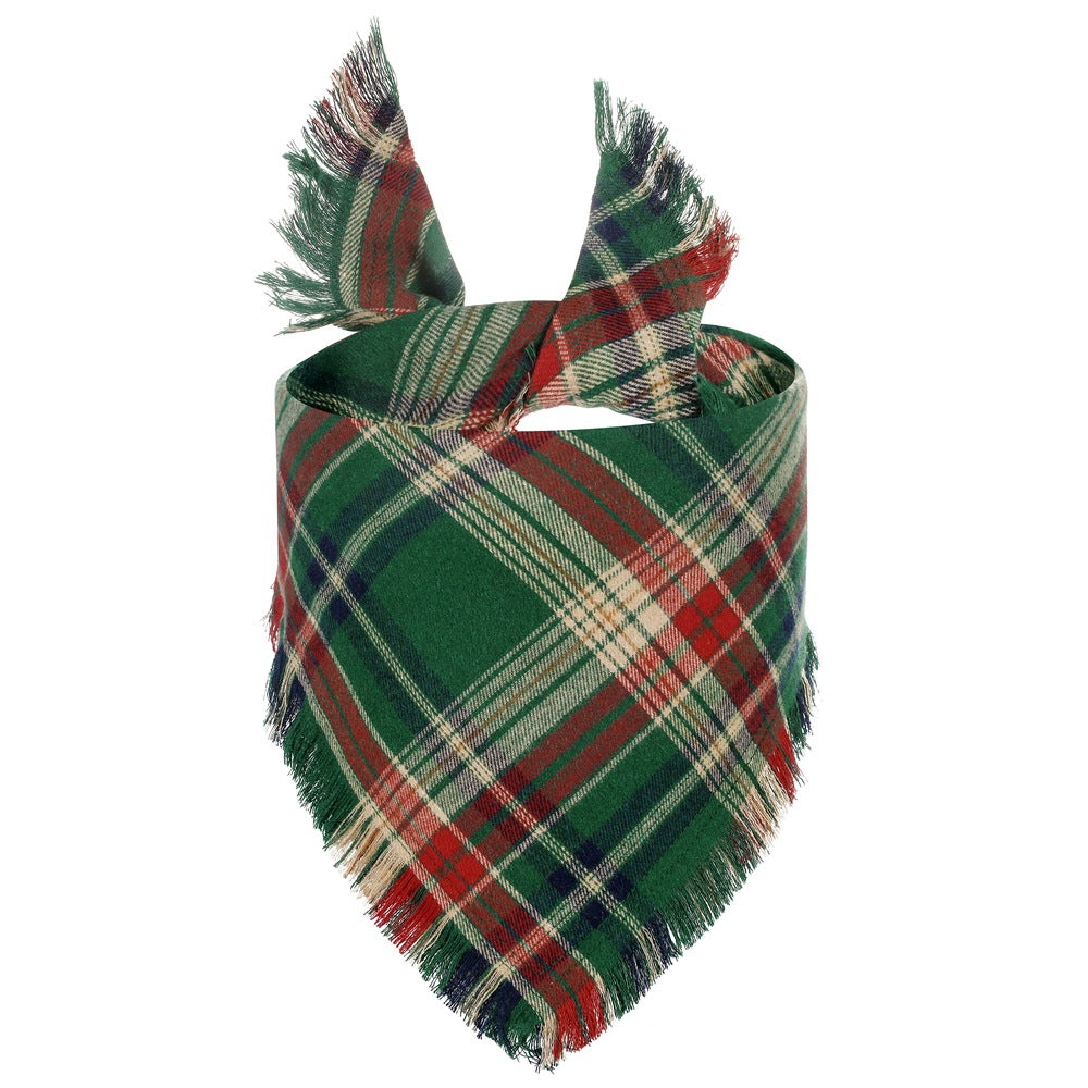Green and red plaid scarf with fringes on a white background