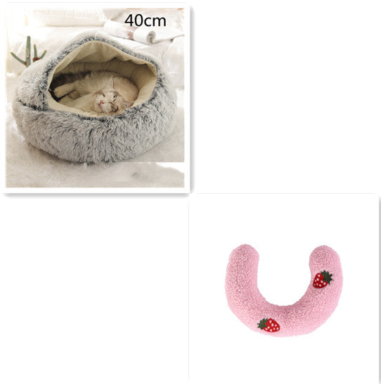 Cat bed with a size indicator and a pink U-shaped pillow with strawberry design on a white background.