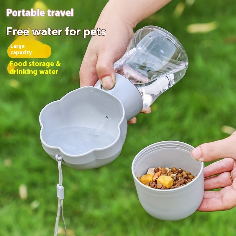 One click dog water dispenser cup releasing fresh water for pets while walking