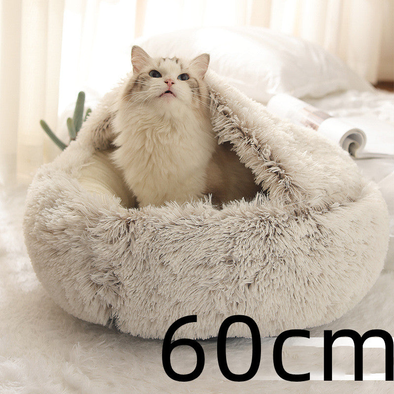 Cat lying in a fluffy pet bed with dimensions '60cm' displayed