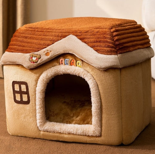 Pet house with a brown roof and beige body on a carpeted floor.