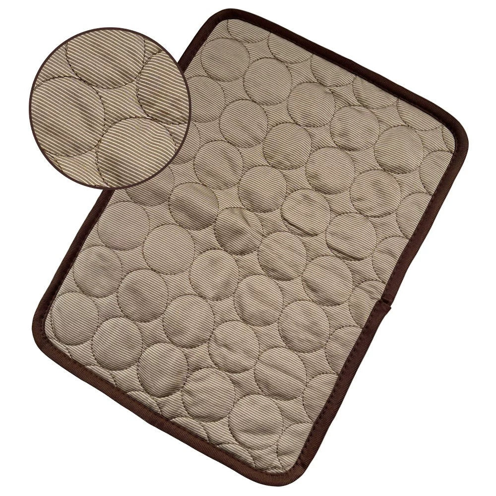 Textured quilted mat with circular pattern on a white background